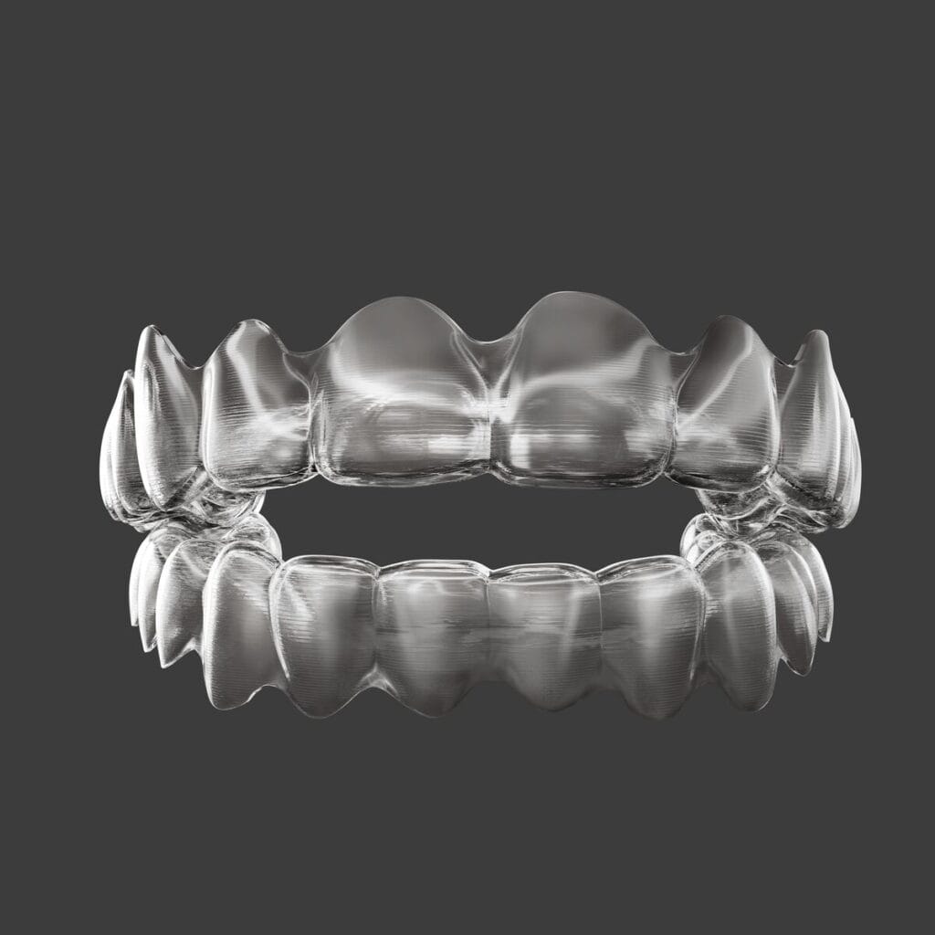 Zdjęcie przedstawia nakładkę Invisalign